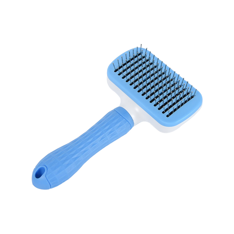 Self cleaning dog pin brush